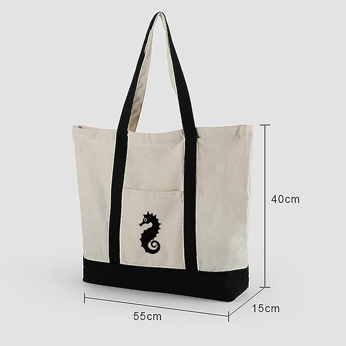 Trendy black and white tote bag adorned with a seahorse, perfect for everyday use or a day at the beach.