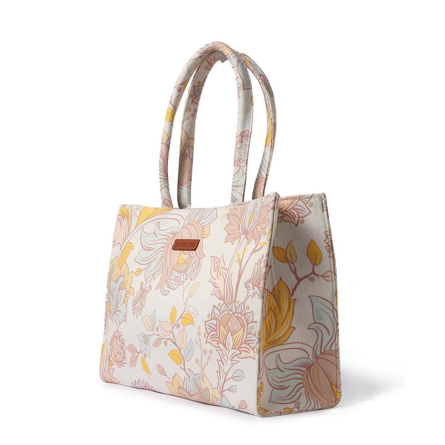 Get your hands on this chic floral print tote bag in white and yellow.