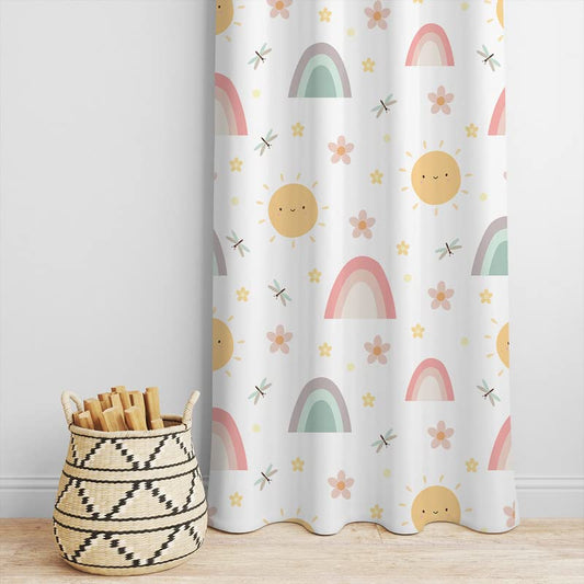 Colorful curtain with sun, flowers, and stars, adding vibrancy and charm to any space.