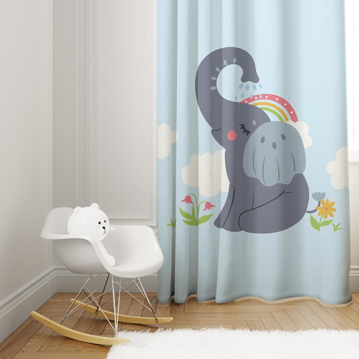 A curtain showcasing an elephant with a cheerful rainbow in the background.