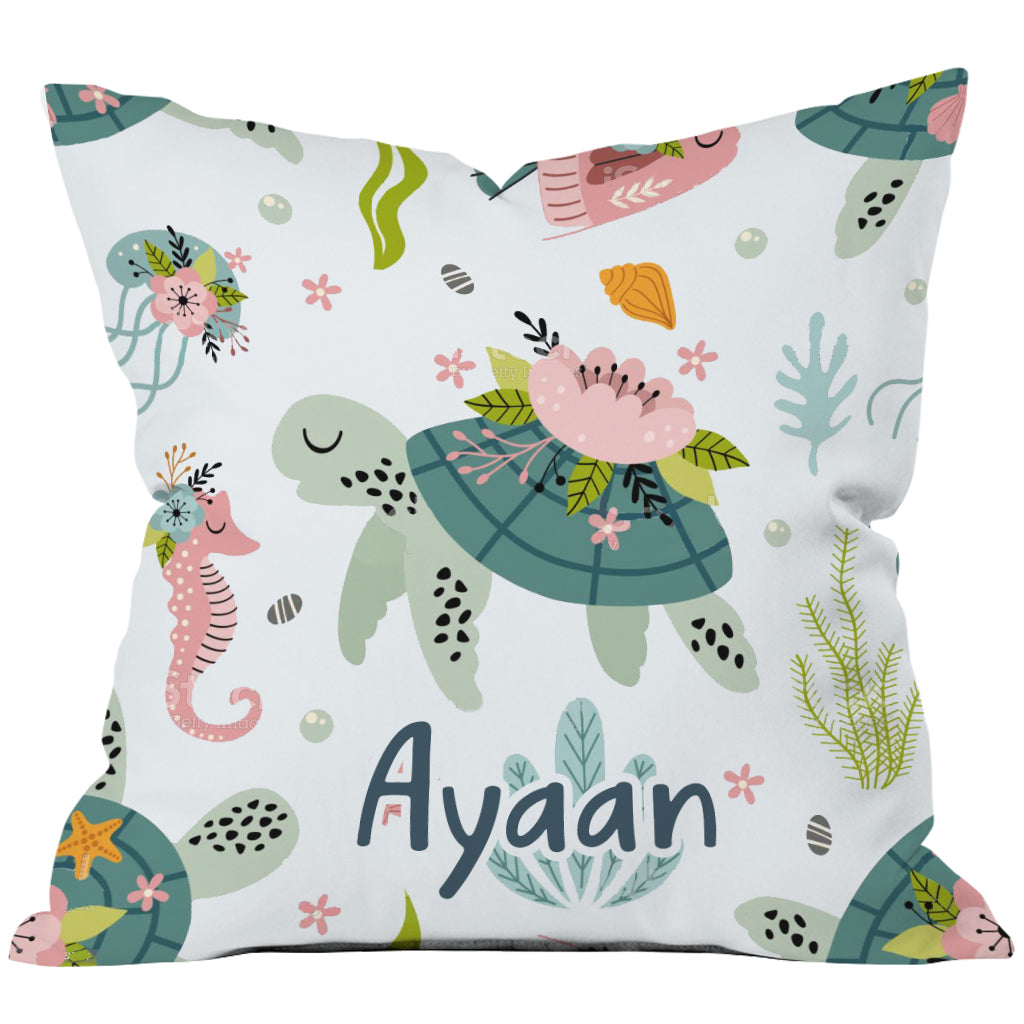 Custom pillow featuring the name Ayan with cute turtle designs.