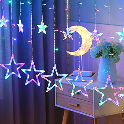 A star and moon hanging from string lights, creating a magical and dreamy atmosphere.