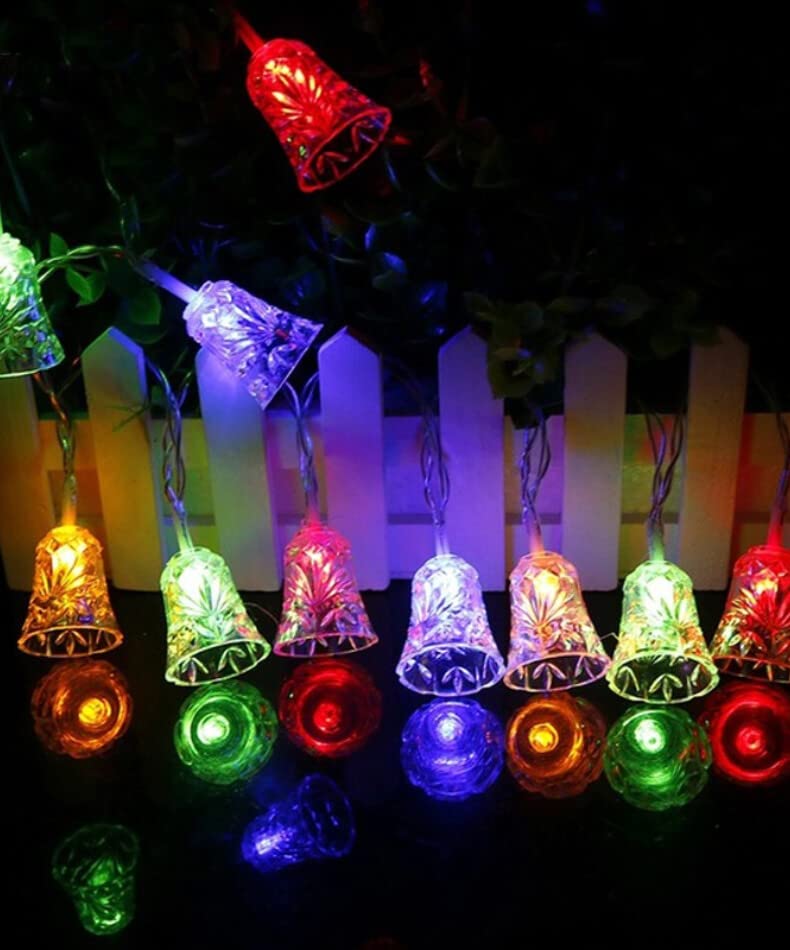 Vibrant lights decorating a plant, creating a cheerful and bright atmosphere.
