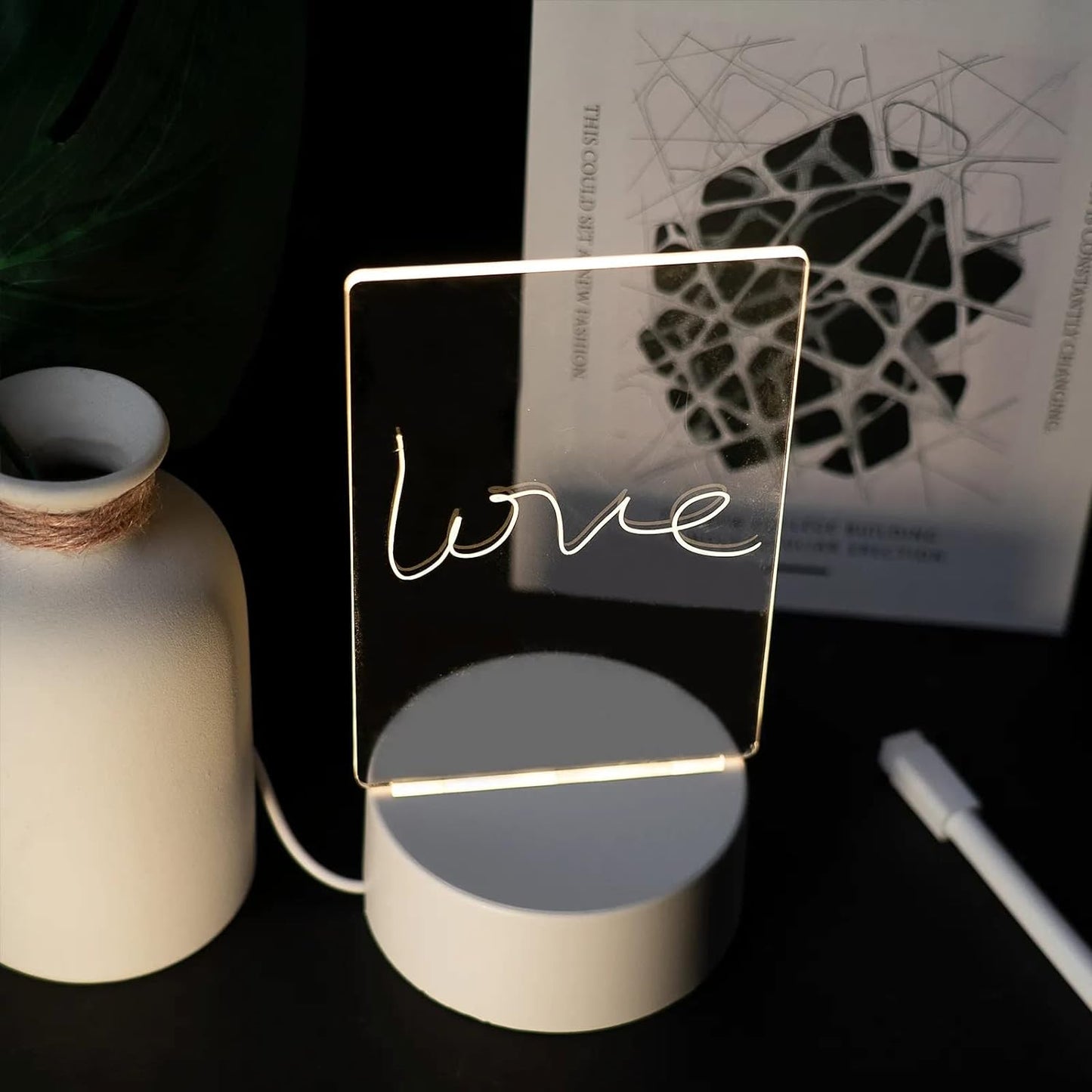 LED lamp with USB charging, emitting warm light for message boards.