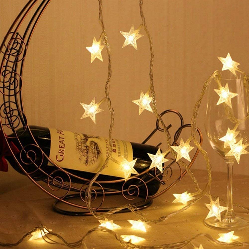 A vase filled with shimmering stars and twinkling lights.