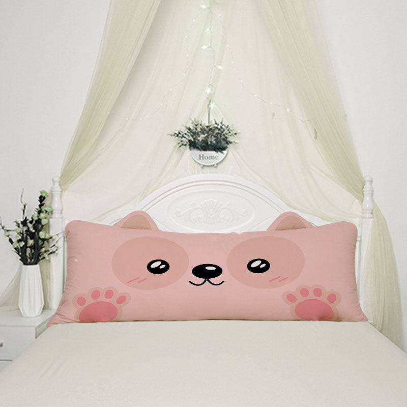 A pink pillow with a cute Bear face on it, perfect for adding a touch of charm and comfort to any space.