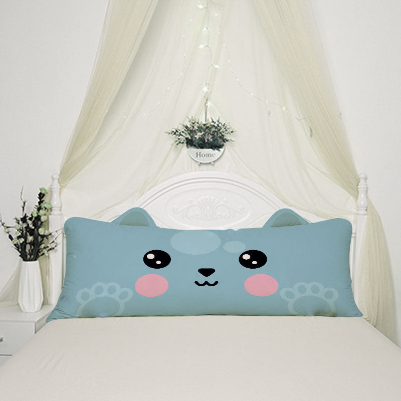 A cute blue pillow with a cat face on it, perfect for cat lovers to cuddle with and add a touch of feline charm to their decor.
