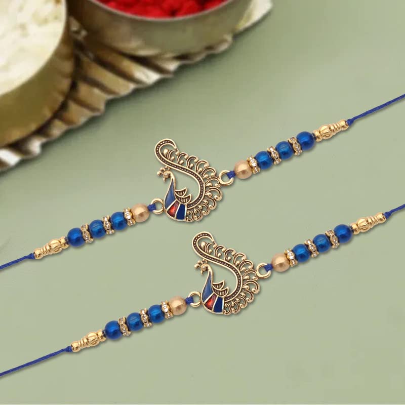 Two elegant blue rakhi with gold beads and a gold chain, a beautiful gift for Raksha Bandhan.