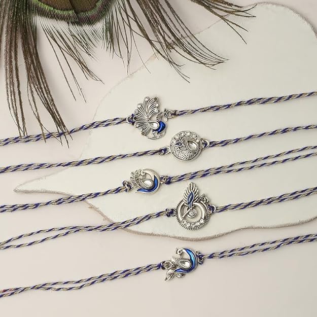 Four silver and blue rakhi , perfect for celebrating Raksha Bandhan with style.