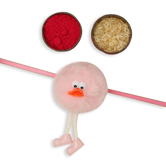 A pink rakhi with a red bowl and a bowl of rice, representing a cute and playful combination.