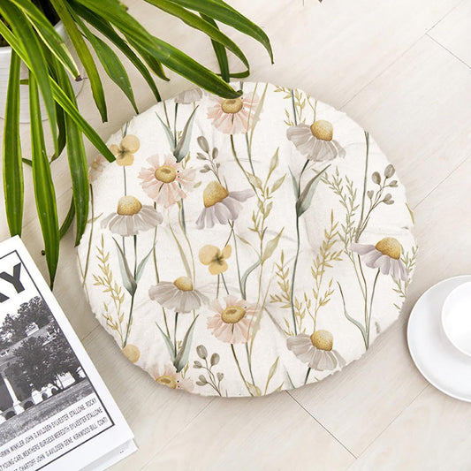 A round floor mat featuring a floral and leaf design in vibrant colors.