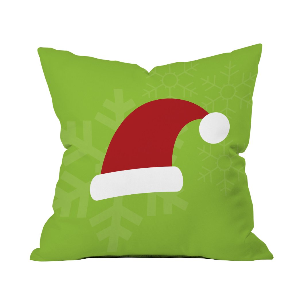A cozy green Santa hat pillow adorned with white snowflakes, perfect for holiday decor and festive cheer.