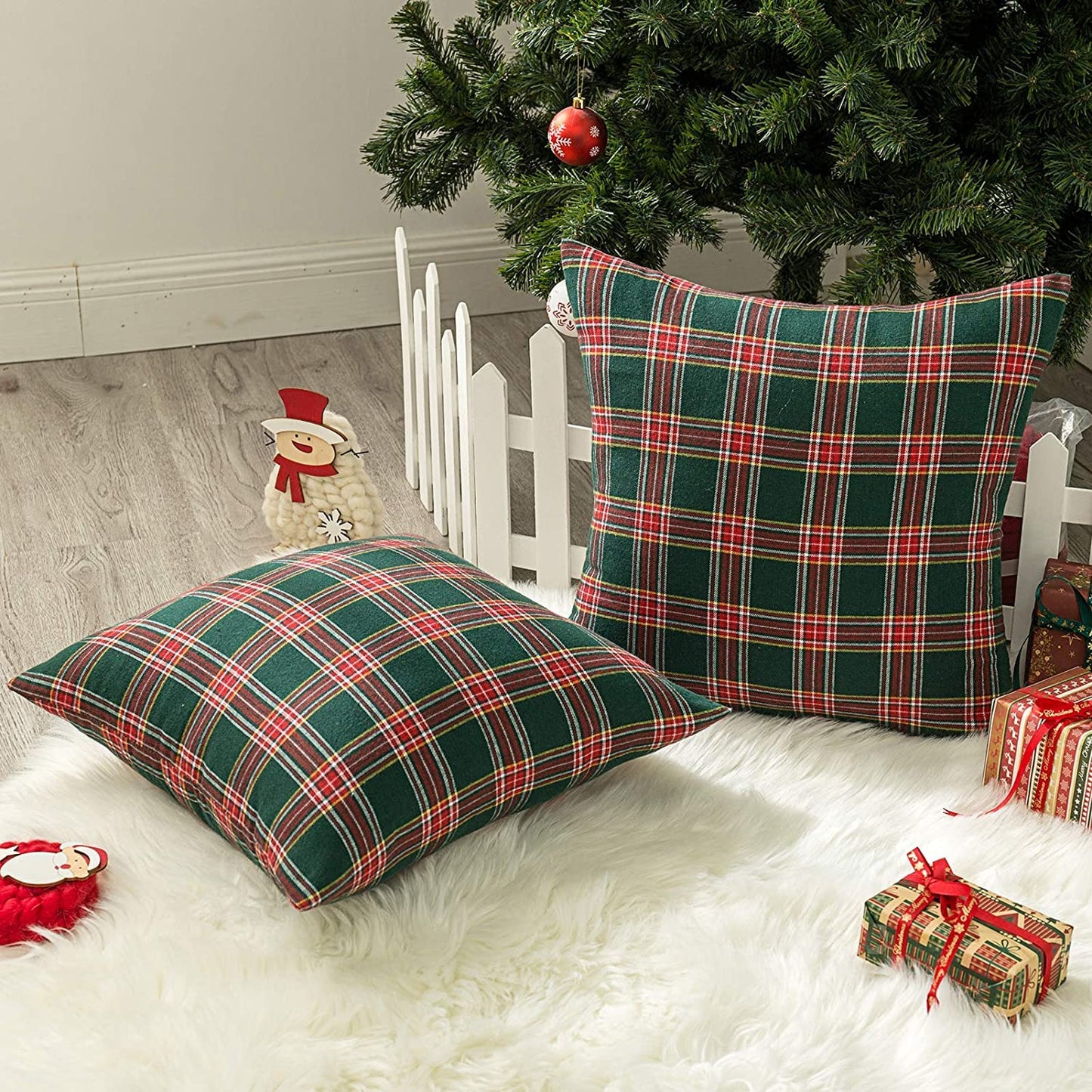 A pair of plaid-patterned pillows, perfect for enhancing comfort and style in your living area