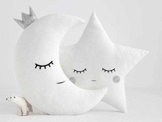 These adorable white pillows with blue eyes and a star on top will bring a fun and quirky vibe to your space.