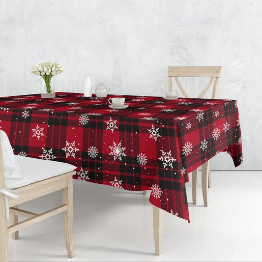 Get into the holiday spirit with a red plaid tablecloth featuring snowflakes.