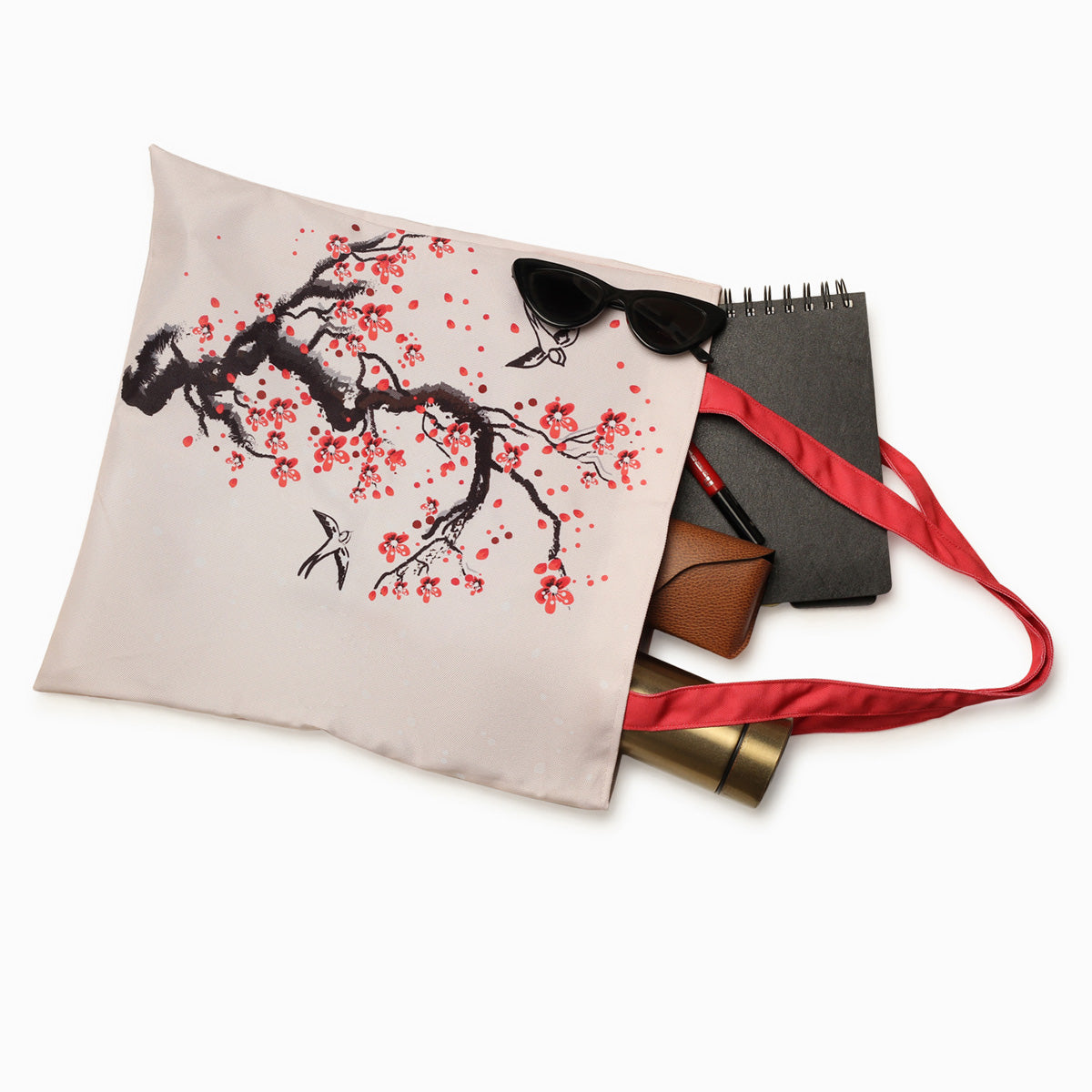 Add a touch of floral charm to your look with a tote bag featuring a delightful cherry blossom design, a must-have accessory.