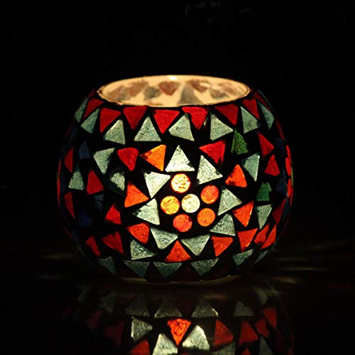 Decorative glass candle with vibrant design.