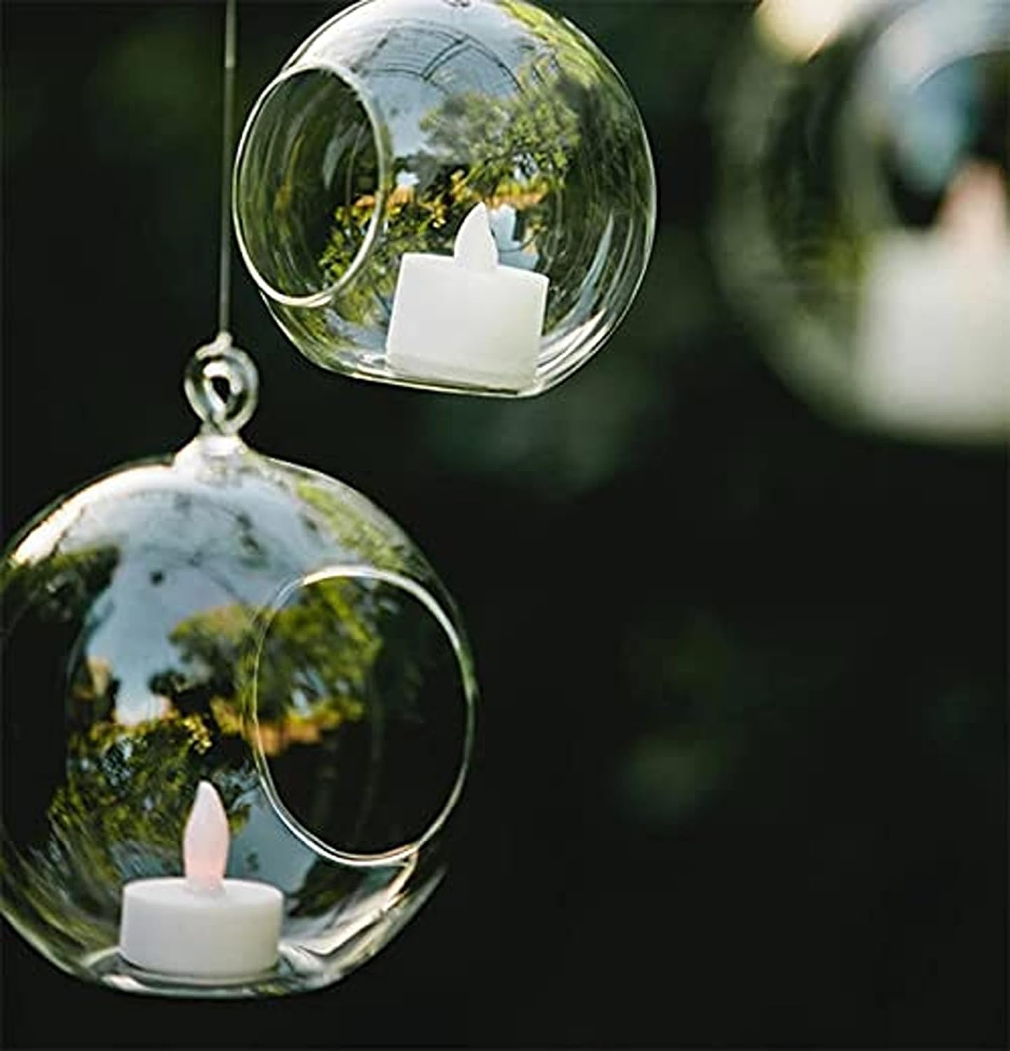 Elegant table decor featuring a tree and candles for a festive event.