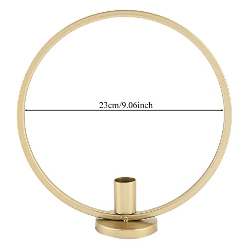 Pair of gold candle holders adorned with bear design.