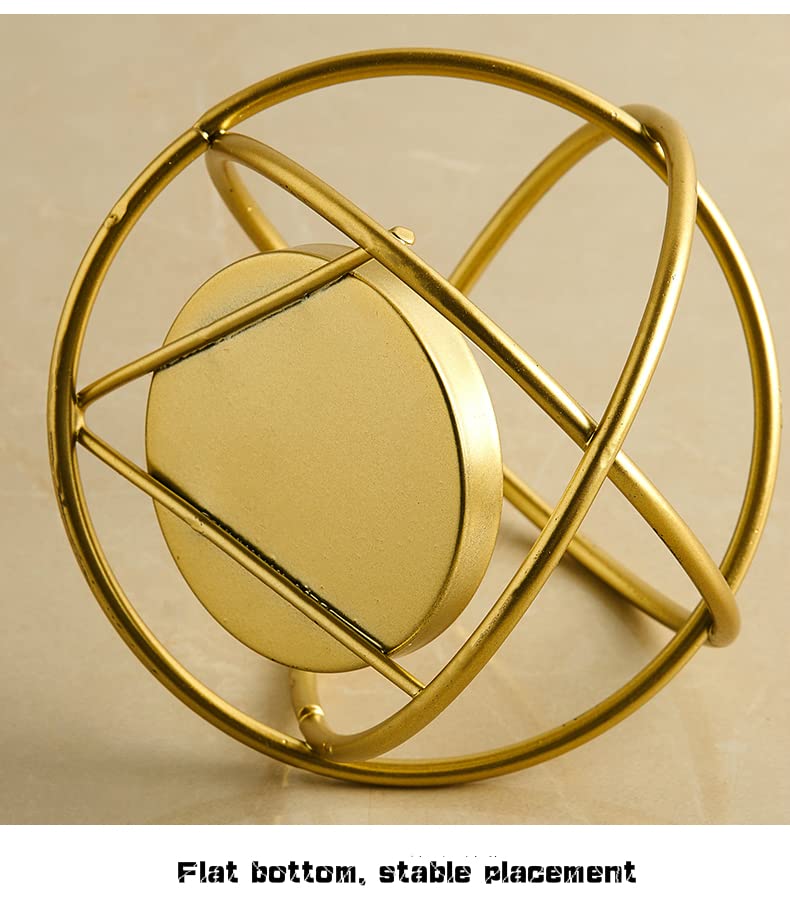 Decorative gold metal tealight holder with purple candle for ambiance.