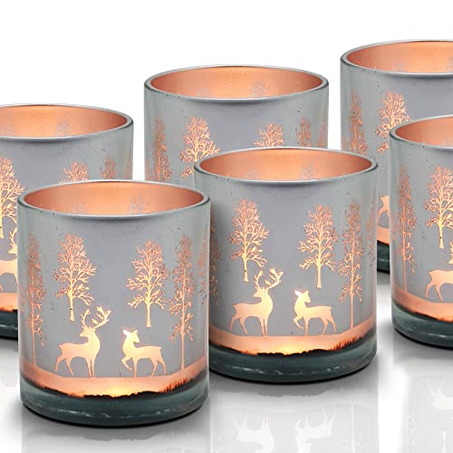 Two glass candles with deer designs, great for adding a festive and cozy vibe to your home.