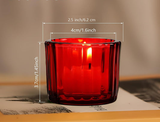 Red glass candle holder with dimensions on a neutral background