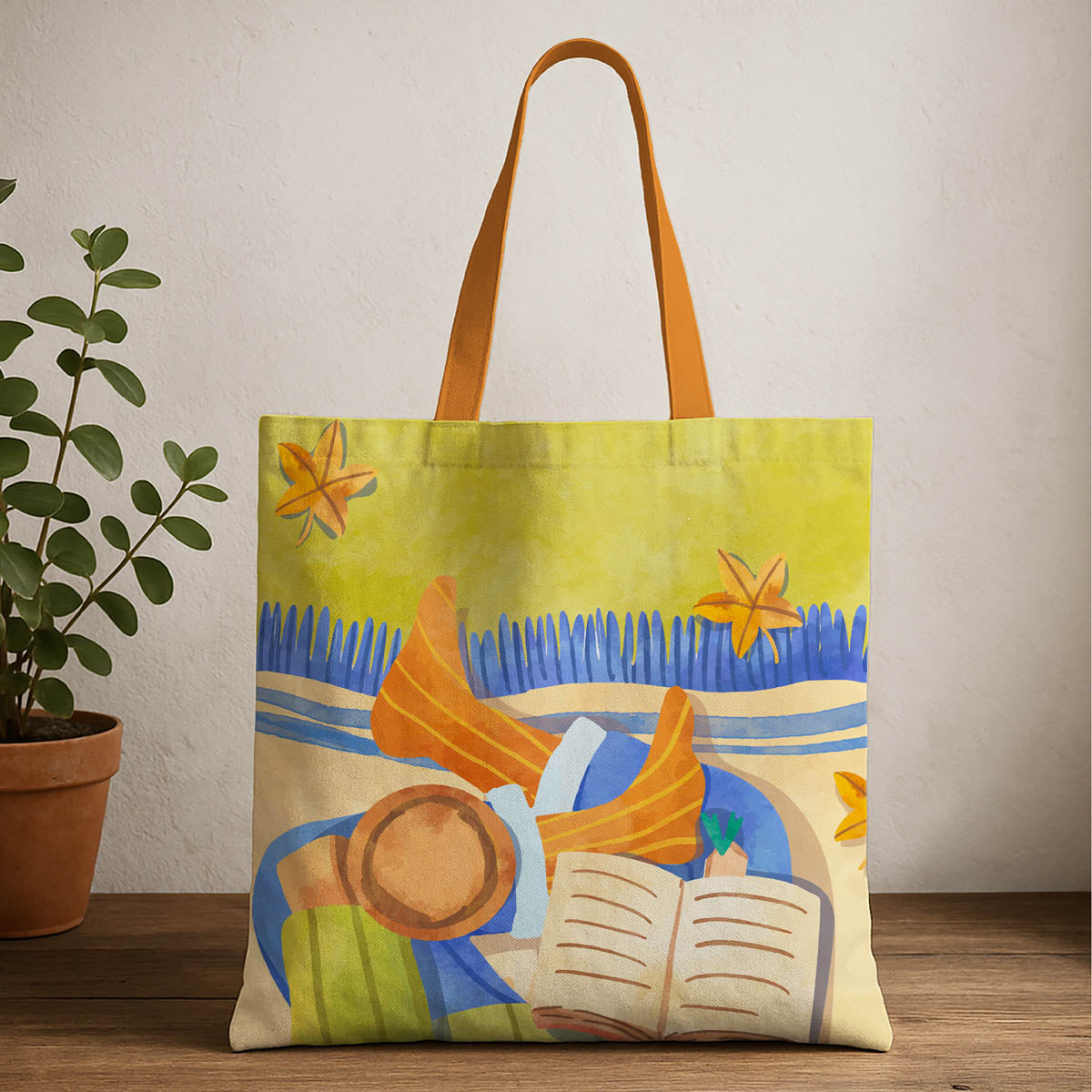 A tote bag featuring a painting of a woman engrossed in reading a book.