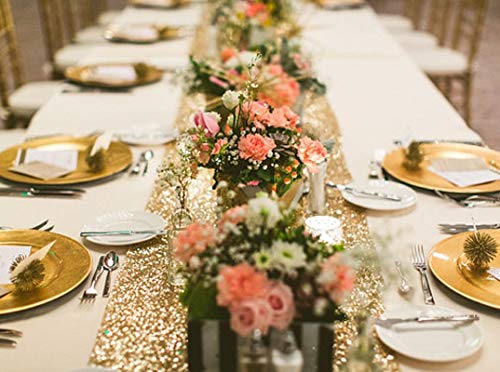 Classy table arrangement with gold and white tablecloths and settings