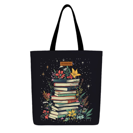 A tote bag filled with colorful books and fresh flowers, showcasing a blend of literature and nature.