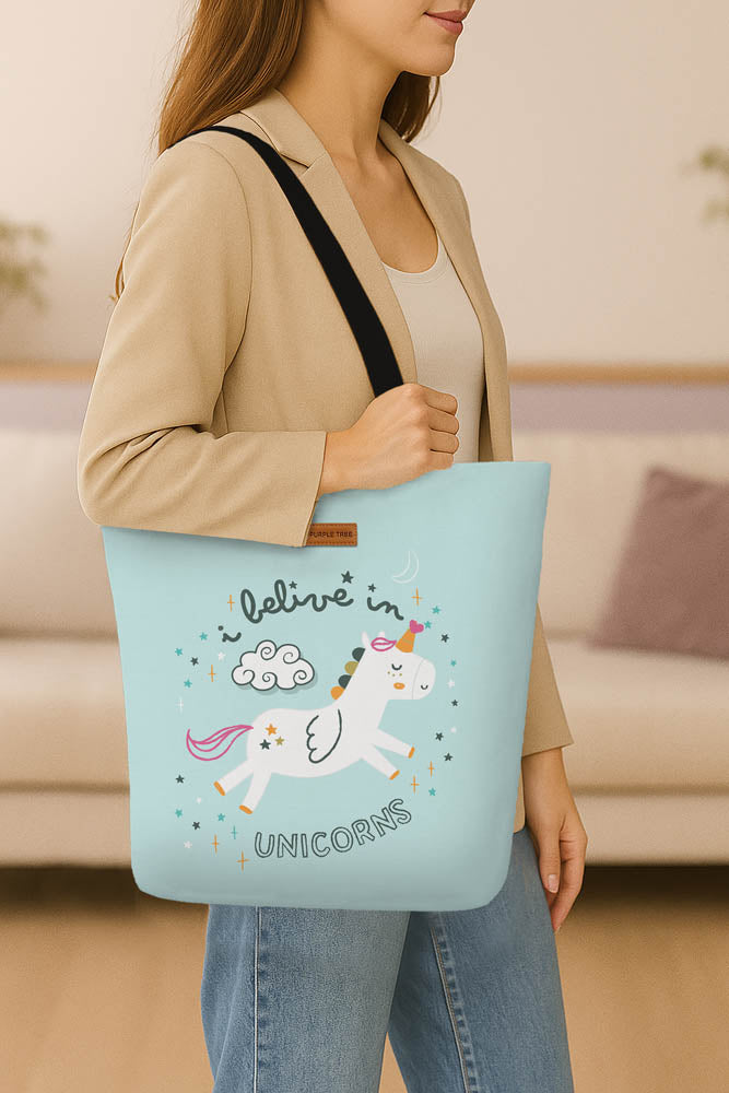 A cotton tote bag adorned with a whimsical unicorn graphic.
