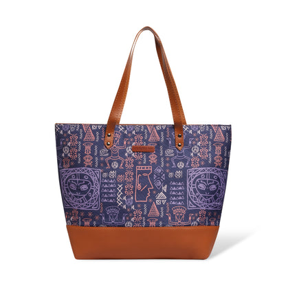 Trendy tote bag in purple and brown on a chair.