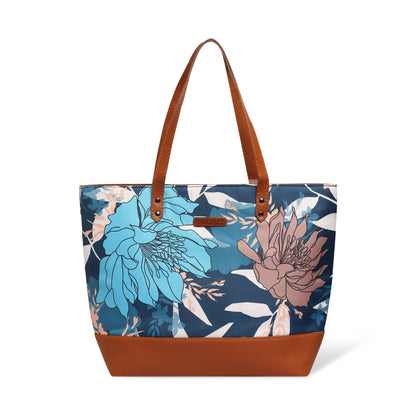 A chair next to a floral-patterned bag.