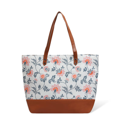 2. Vibrant floral tote bag placed on a chair.