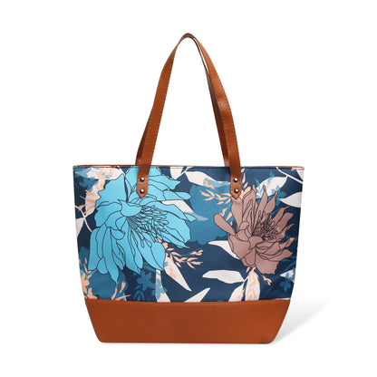 A chair with a stylish floral bag on top.