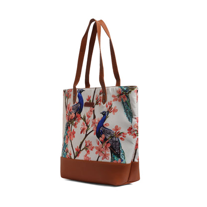Chic tote bag with whimsical bird patterns, a fun and practical accessory for any outfit.