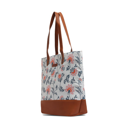 3. Beautiful floral tote bag on a chair.