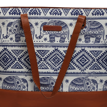 Stylish leather tote bag with elephant print and brown handle.