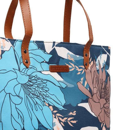 A chair with a stylish floral bag placed on it, creating a chic and sophisticated look in the room.