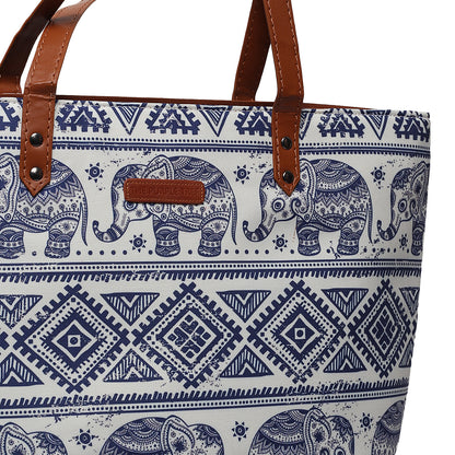 Chic tote bag featuring elephant print and brown leather handle.