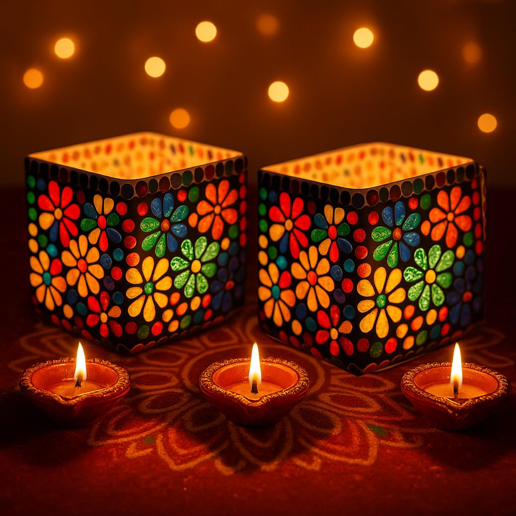 Colorful mosaic lanterns with lit candles on a dark background