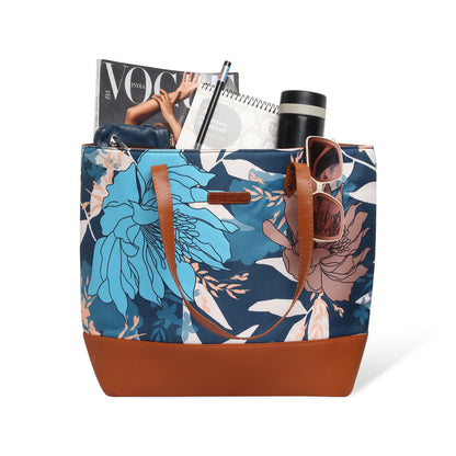 A chair with a floral bag placed on it.