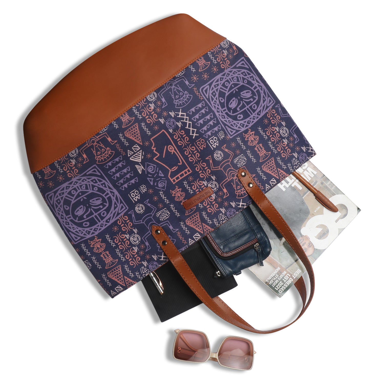Purple and brown tote bag placed on a chair.