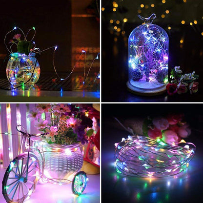 Wine bottle with illuminated flower decoration.