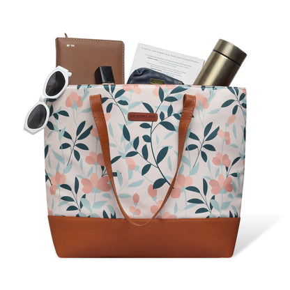 Chic tote bag featuring floral pattern and leather handle