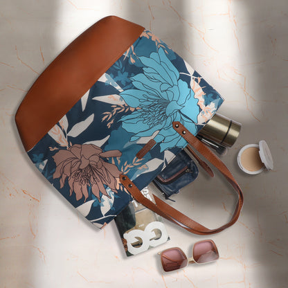  A chair holding a beautiful floral bag, enhancing the aesthetic appeal of the space.