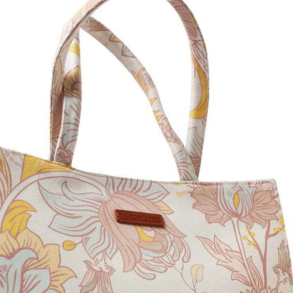 Trendy tote bag in white and yellow floral print, adds a pop of color to any outfit.
