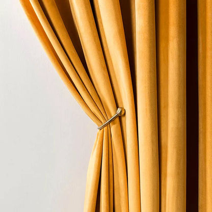 Bright yellow curtain with hook.