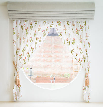 Pink floral curtain with leafy accents, creating a charming and elegant atmosphere.