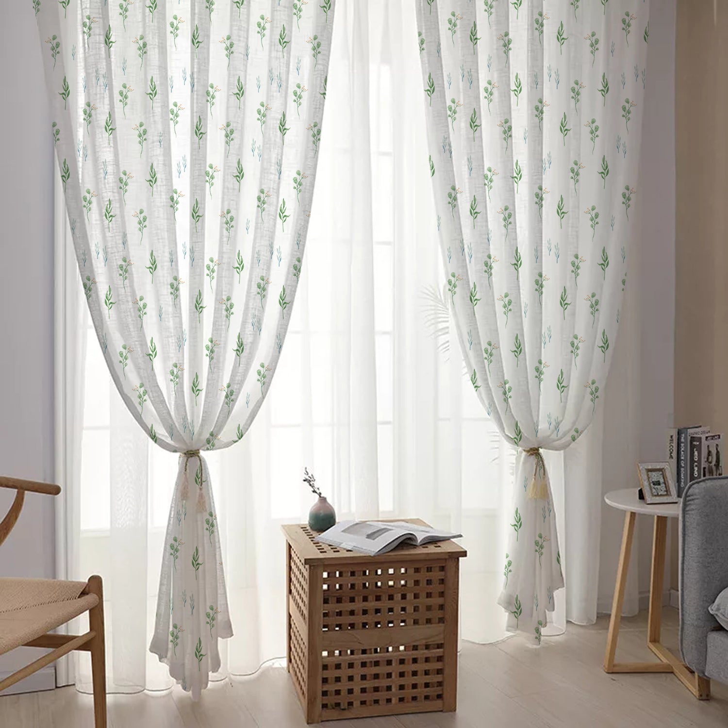  Curtain adorned with green foliage and floral accents, creating a serene and natural atmosphere.