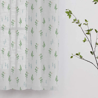 Decorative curtain featuring green leaves and flowers, perfect for a botanical-themed room.
